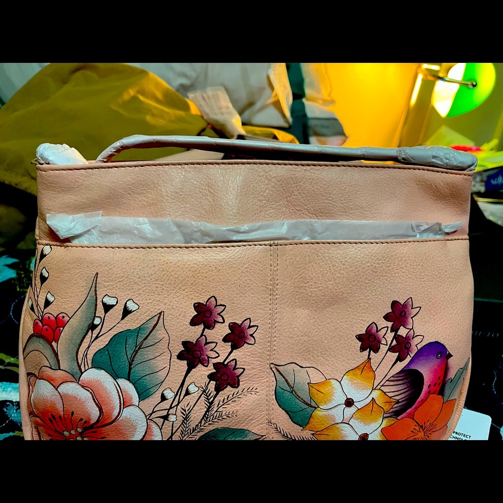 New still has tags on it. Flip over style. Pretty purse